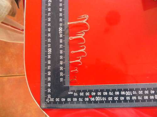 APPROXIMATELY 500 3 ANGLE HOOKS (NEVER BEEN USED)